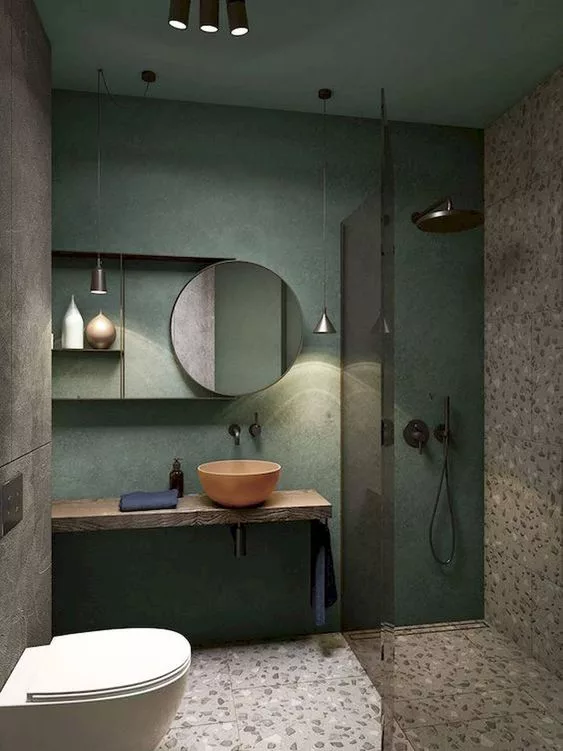 vonios kambario dizainas,oranžinis  dubuo praustuvui, žalia siena 